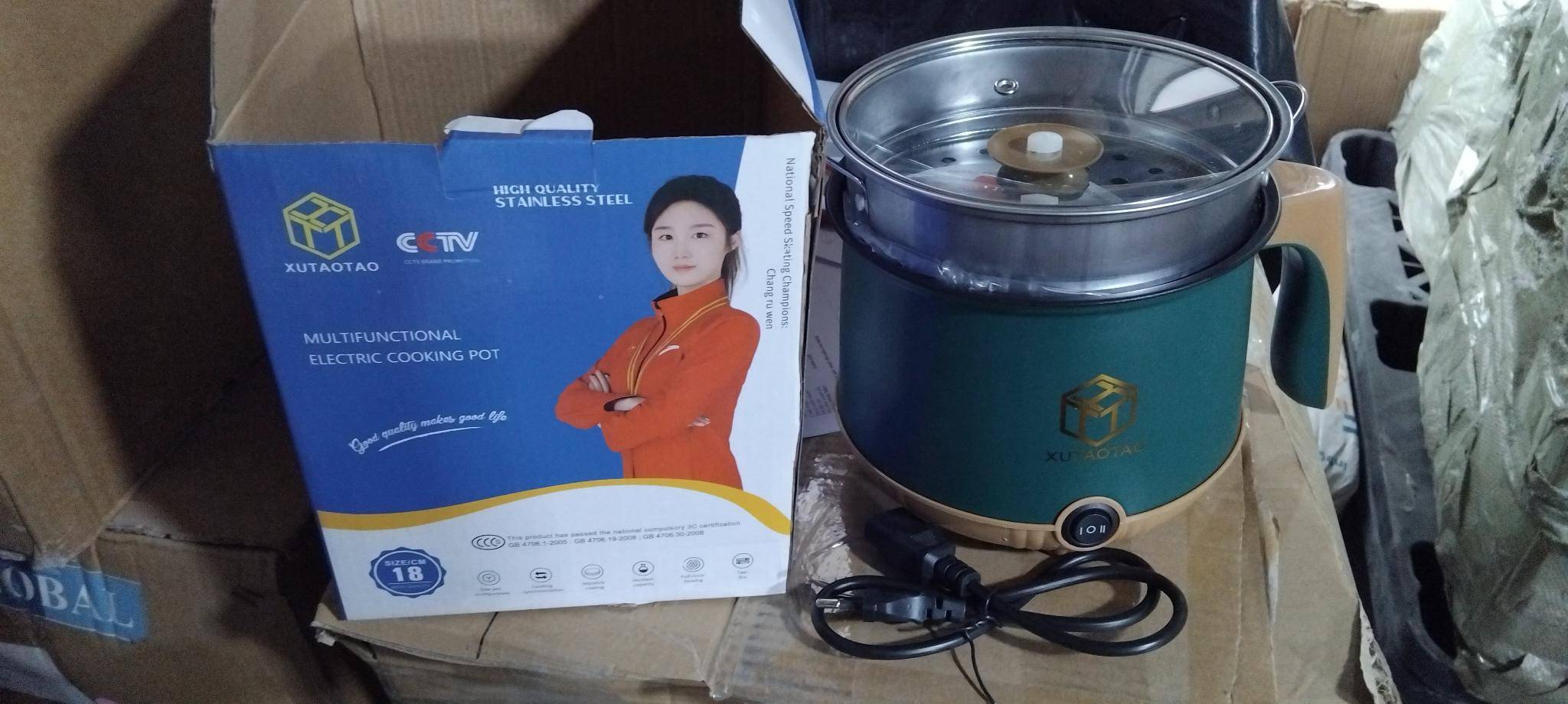 20241203_8MGId61bn7 Nồi lẩu điện đa năng XuTaotao 18cm kèm vỉ hấp inox Tmark (Kiện 48 cái) - Ảnh 1